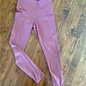 Athleta mauve colored leggings with pockets. Size small, only worn a few times